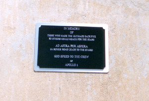 Plaque on south side of stand