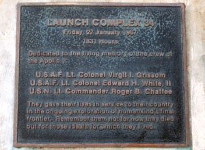 Plaque on west side of stand